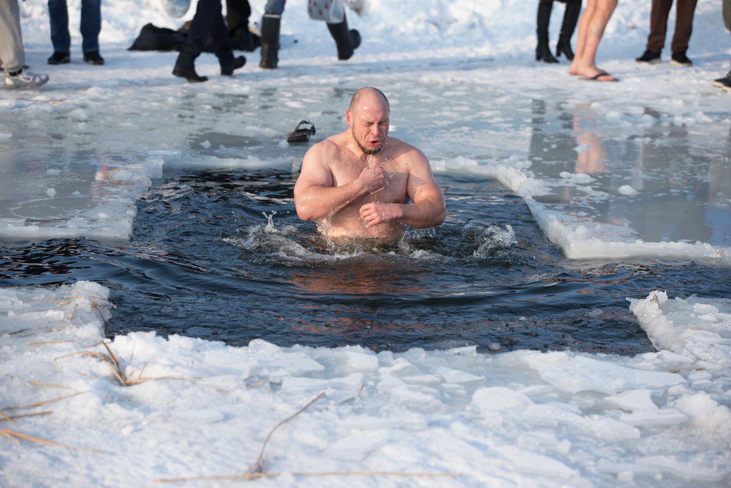 Epiphany. Bathing in the ice hole. Plunge into the ice water